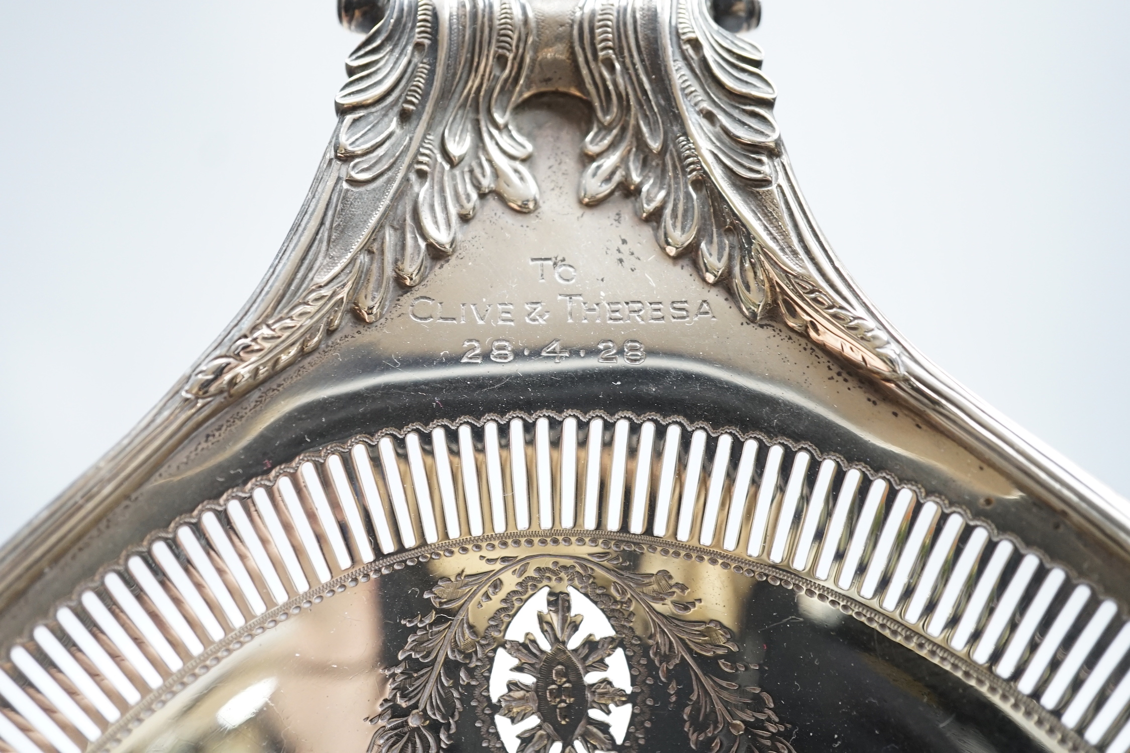 An Edwardian pierced silver two handled oval pedestal dish, with engraved inscriptions, Thomas Bradbury & Sons, Sheffield, 1907, 36.9cm, 18.8oz.